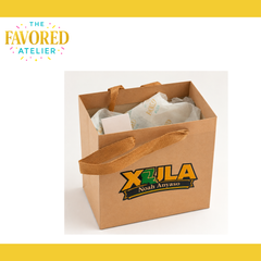 Personalized kraft gift bag with custom tissue and gift card packaging