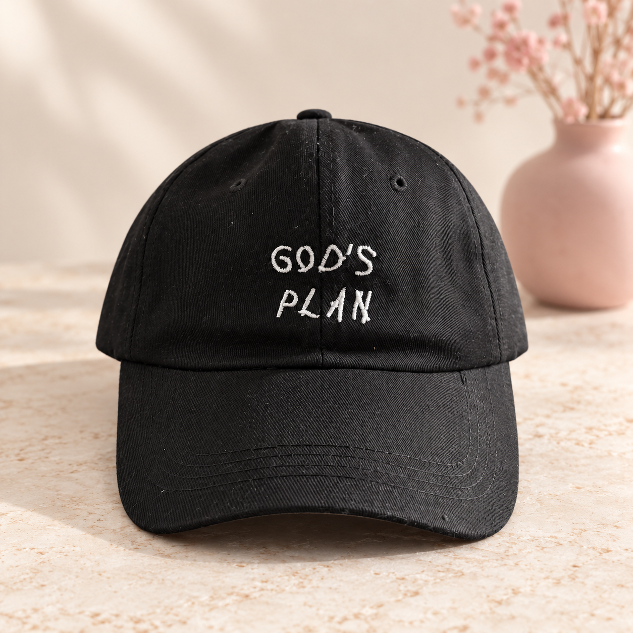 Black cap with white embroidered GOD'S PLAN lettering
