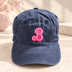 Denim washed cap with embroidered bright pink script B